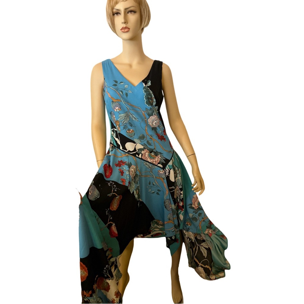 Gorgeous Asymmetrical Sleeveless Eclectic patterned!! Free and Flows nicely.,💙